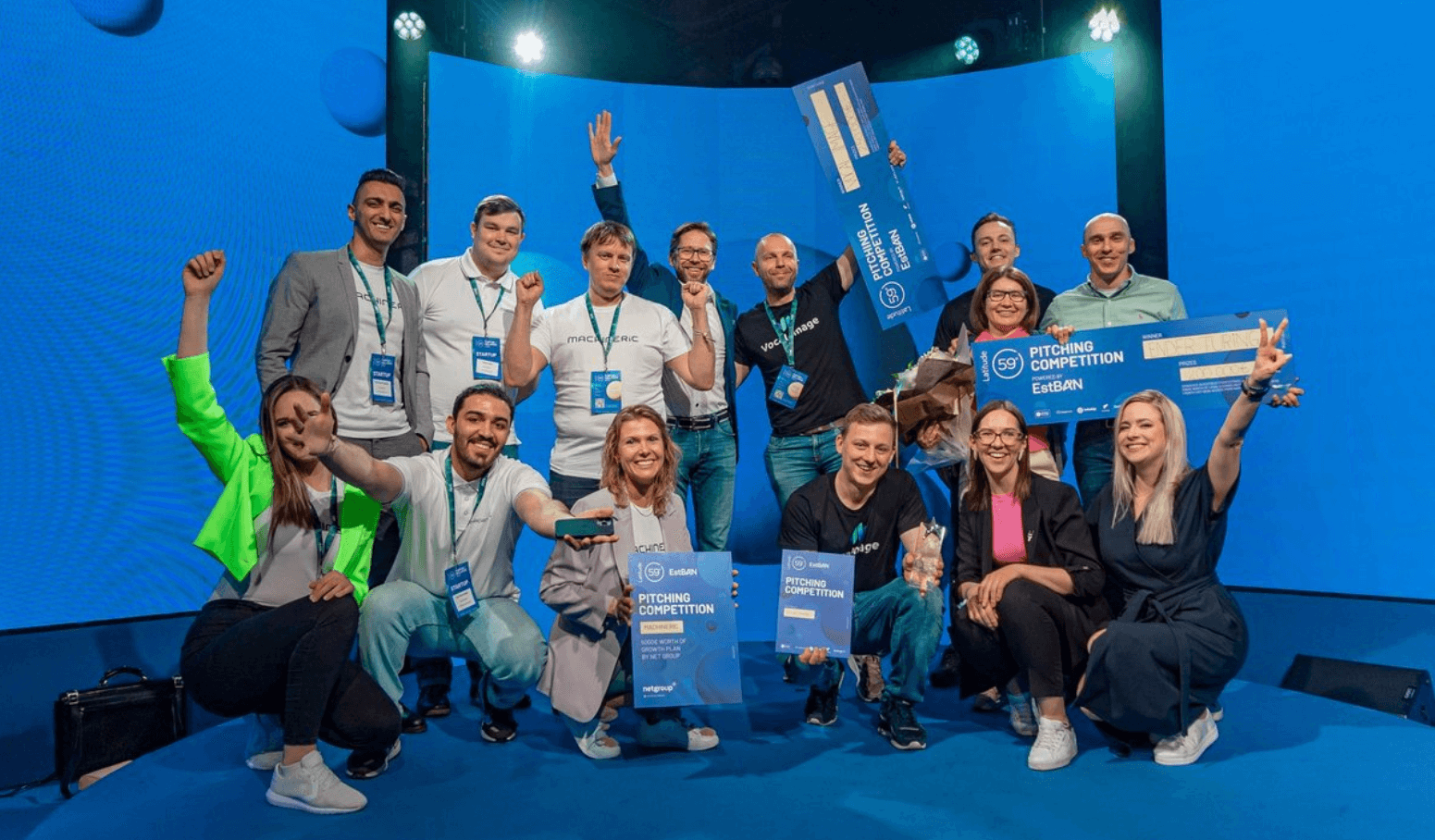 The two winning teams of Latitude59 conference with the prizes